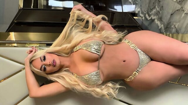 Blonde Bombshell's Glittering Pussy
