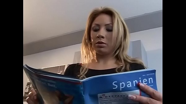 Blonde MILF gets a Handjob While Planning Her Vacation