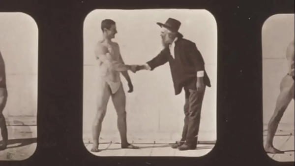 Old Man Shakes Hand with a Hairy Beast